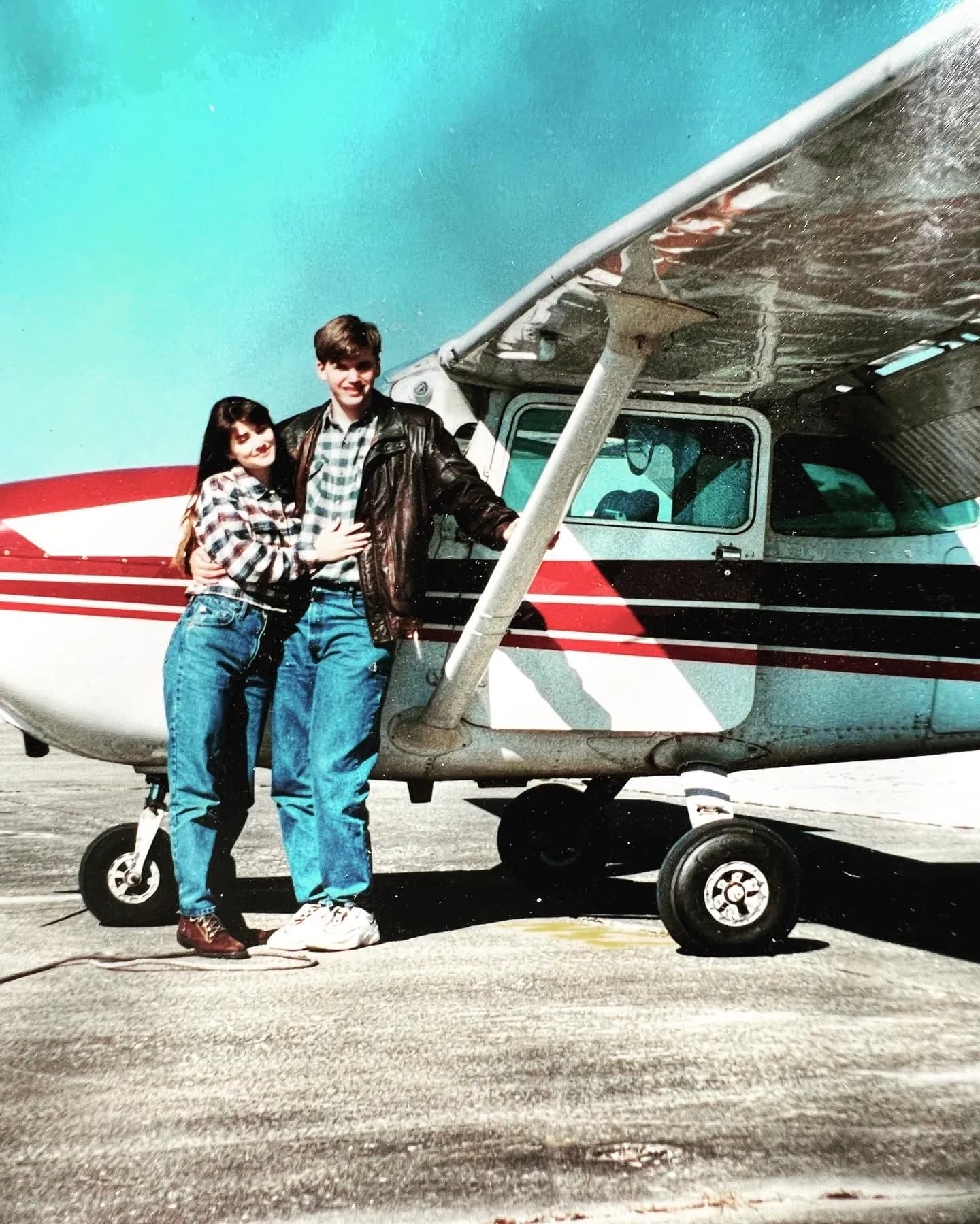 Young Sarah and Josh by airplane